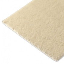 Wool mat with rubber backing